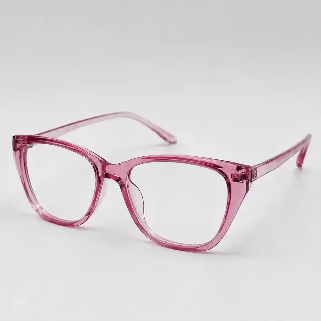 Translucent pink cat-eye full-rim frame with a pointed upper edge, a stylish daily eyeglasses option for women.